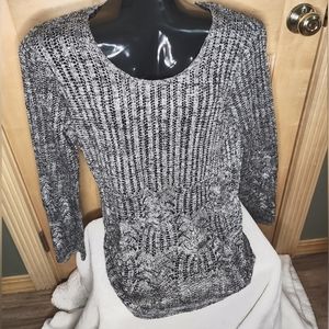 Open weave, sequenced, long sleeve sweater that is like new.